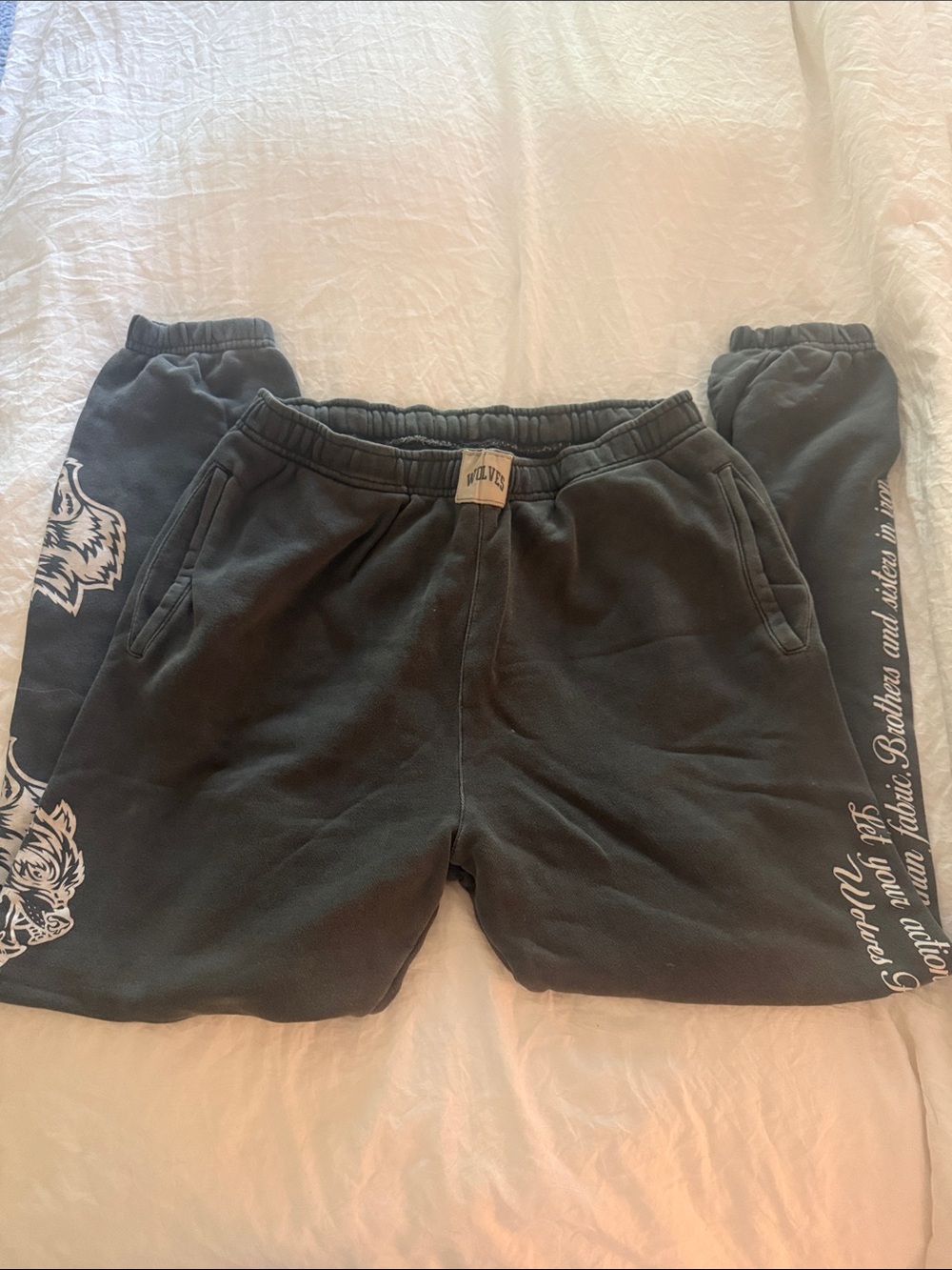 Women’s Black Graphic Jogger Sweatpants with White Wolf and Script Details
